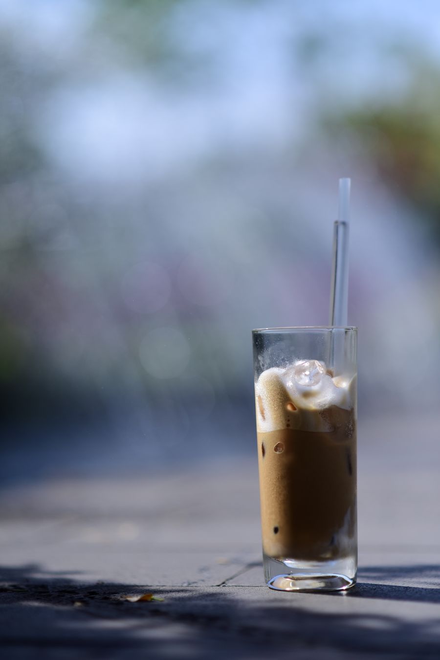 Iced latte served cold over ice on a sunny day
